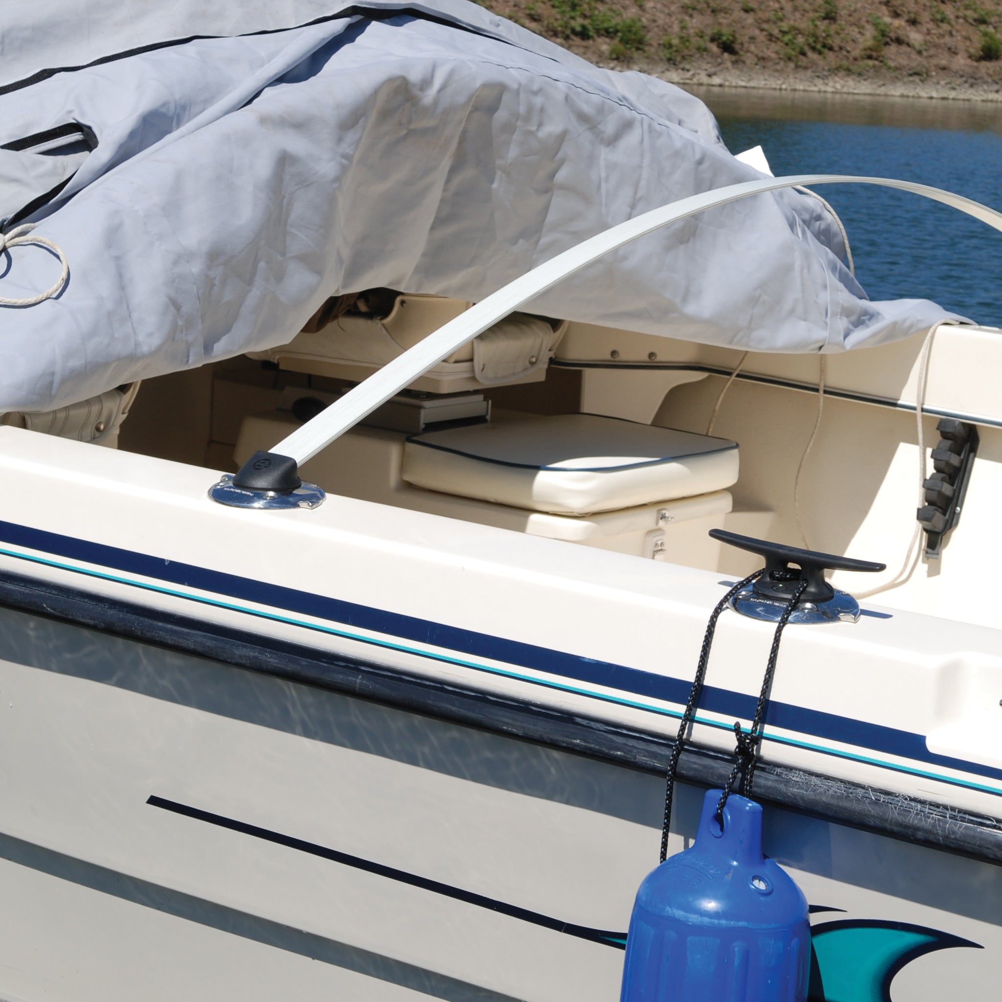 A view looking at the port side of a fishing boat with the Burnewiin CS3080 Boat Cover Support Socket inserted into a GM650 mount.