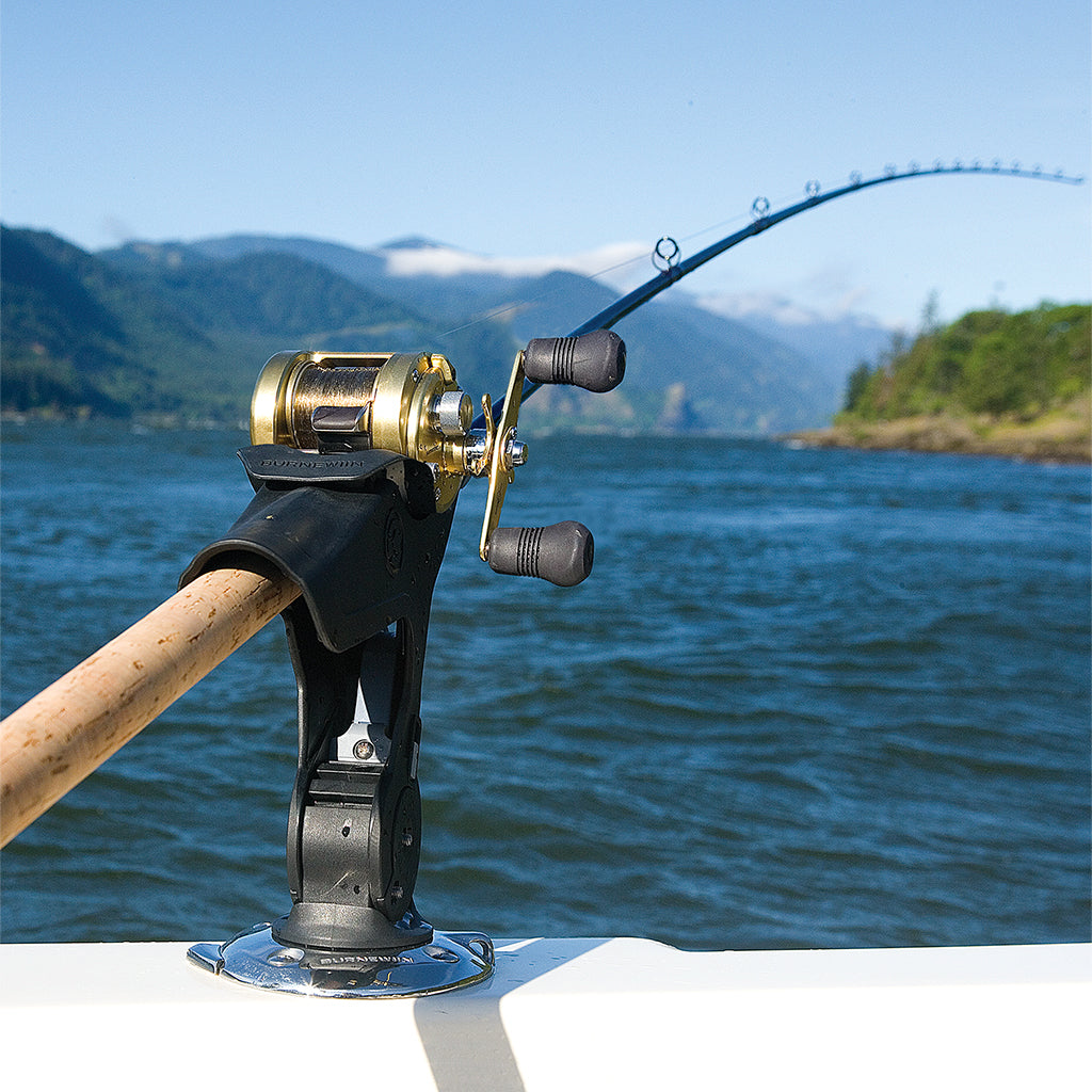 From a handle to tip perspective, the Burnewiin RH5710 Rod Holder is inserted into a GM650 mount installed on a boat gunwale.