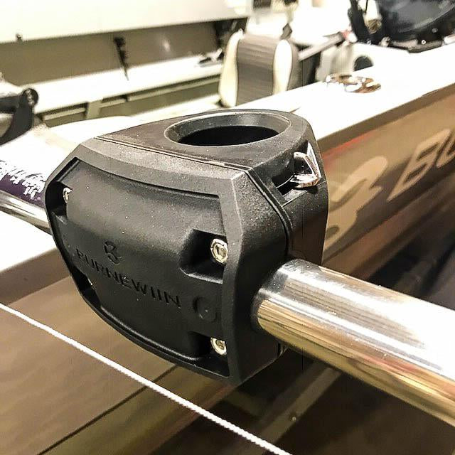 A closeup of the Burnewiin RK300 Rail Mounting Kit assembled on the extended bow rail of a fishing boat.