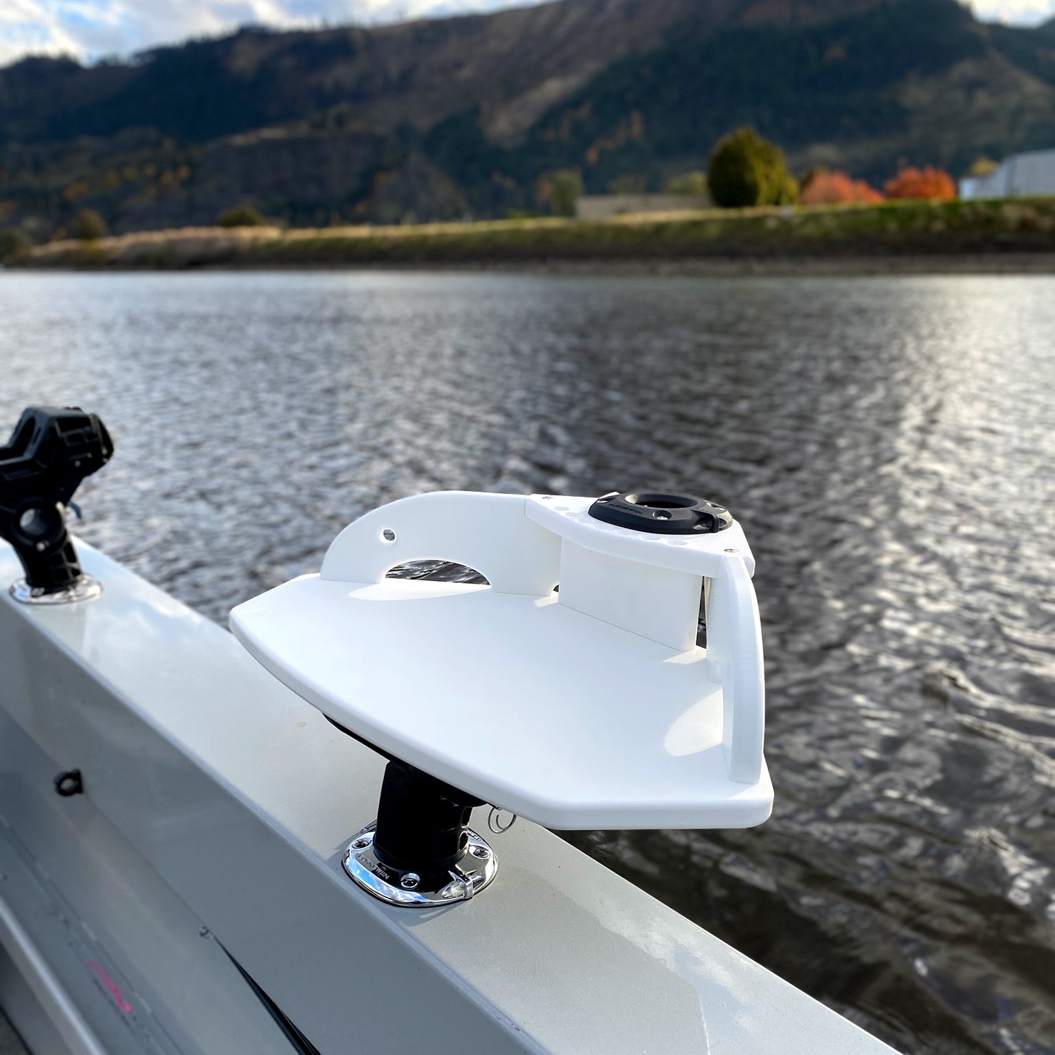 in CB3220 Cutting Board is mounted with a GM650 on the starboard gunwale with a foothill in the background.