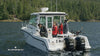  Resort and Marina crew standing in the bow of a Boston Whaler Conquest boat outfitted with Burnewiin products.